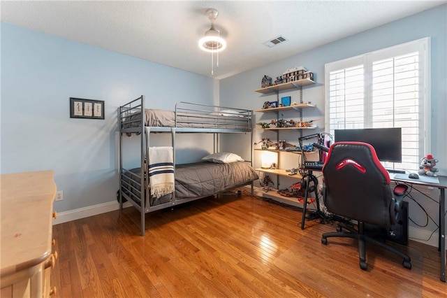 475 Chippenham Ct, Alpharetta, GA 30005 - bedroom with wood finished floors, an office area, and ceiling fan