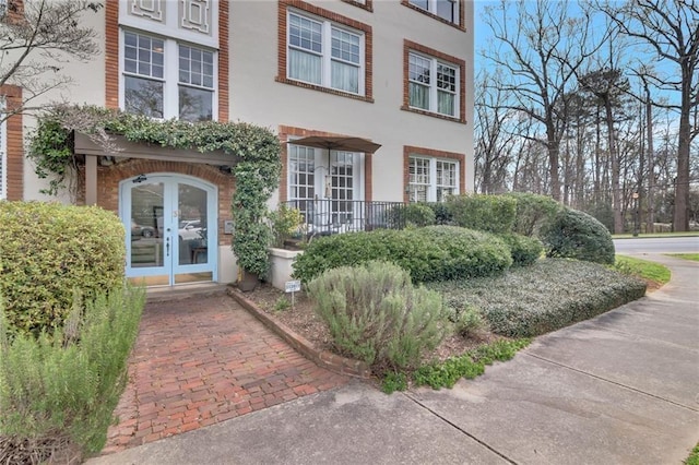 doorway to property featuring french doors