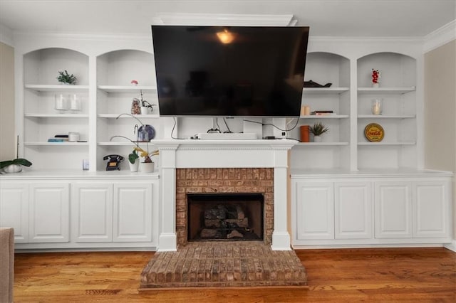 3937 Covey Flush Ct SW Unit 25, Smyrna, GA 30082 - living area featuring light wood-type flooring, built in shelves, and crown molding