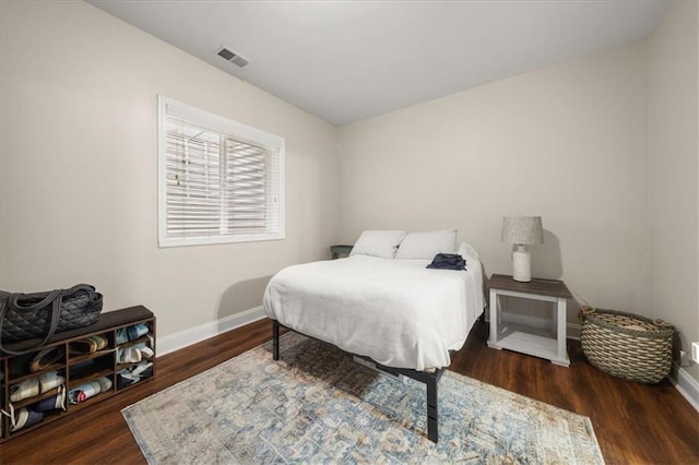 3937 Covey Flush Ct SW Unit 25, Smyrna, GA 30082 - bedroom with baseboards and wood finished floors