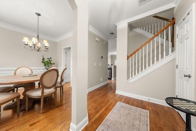 3937 Covey Flush Ct SW Unit 25, Smyrna, GA 30082 - foyer featuring light wood finished floors, stairway, ornamental molding, a chandelier, and baseboards