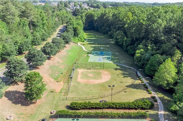 drone / aerial view featuring a rural view and a wooded view