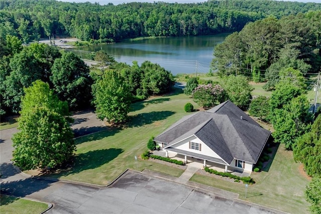 aerial view featuring a water view and a view of trees