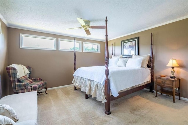 268 Tuck St, Cedartown, GA 30125 - bedroom with ornamental molding, a textured ceiling, carpet floors, a ceiling fan, and baseboards