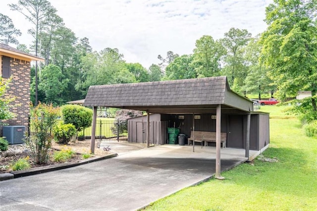 268 Tuck St, Cedartown, GA 30125 - view of car parking with driveway and a storage shed