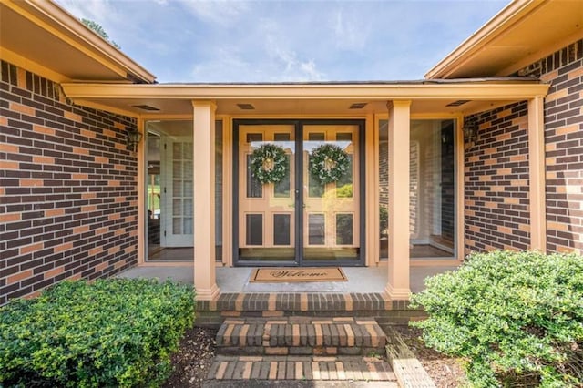 268 Tuck St, Cedartown, GA 30125 - view of exterior entry featuring brick siding and covered porch