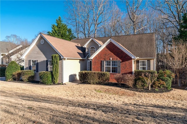 ranch-style house with brick siding