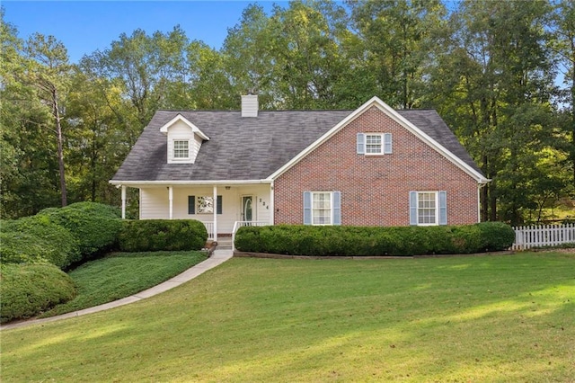 view of front of home featuring a porch and a front lawn