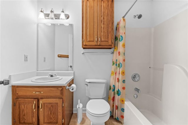 full bathroom with tile patterned floors, shower / tub combo with curtain, vanity, and toilet