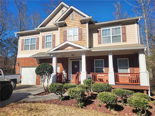 view of front of house with a garage and a porch