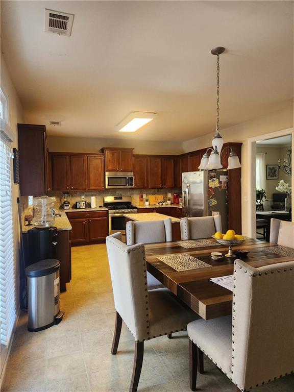 dining room featuring a healthy amount of sunlight