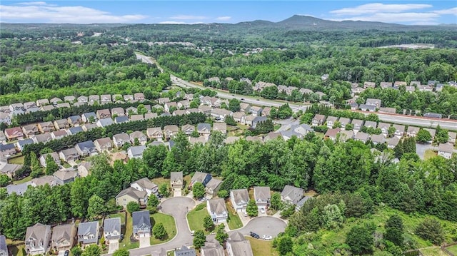 aerial view featuring a residential view and a forest view