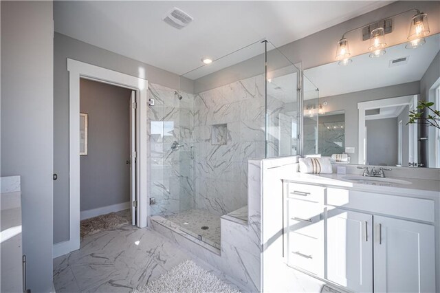 bathroom with tile floors, a shower with door, and oversized vanity