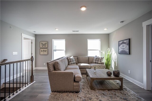 living room featuring dark hardwood / wood-style floors