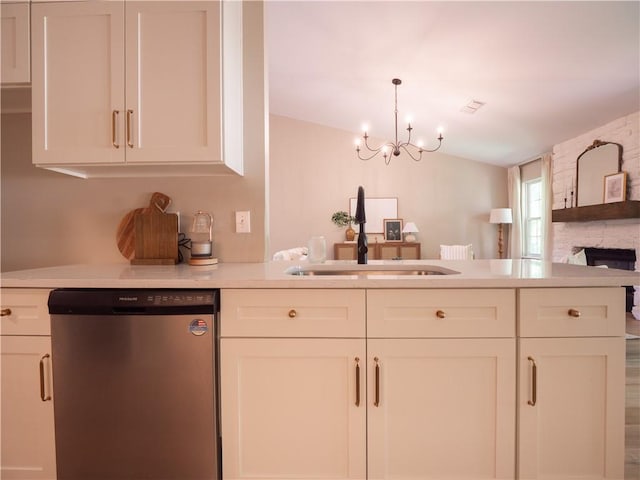 803 Plantation Ridge Overlook, Woodstock, GA 30188 - kitchen with stainless steel dishwasher, a sink, light countertops, and a peninsula
