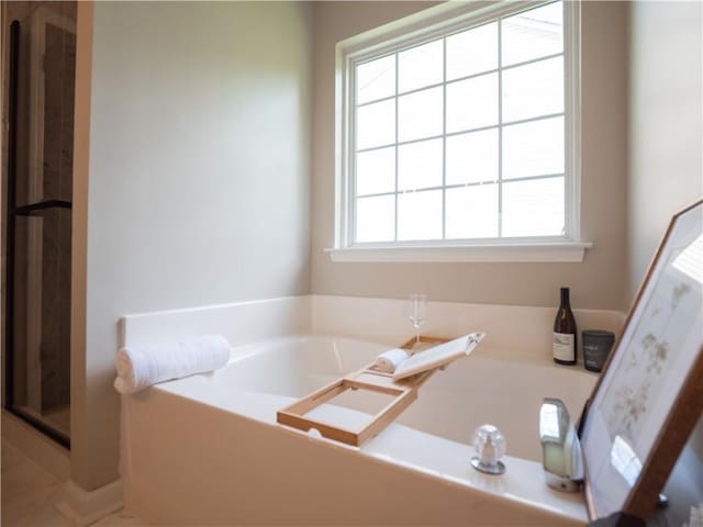 803 Plantation Ridge Overlook, Woodstock, GA 30188 - bathroom with a garden tub and a stall shower