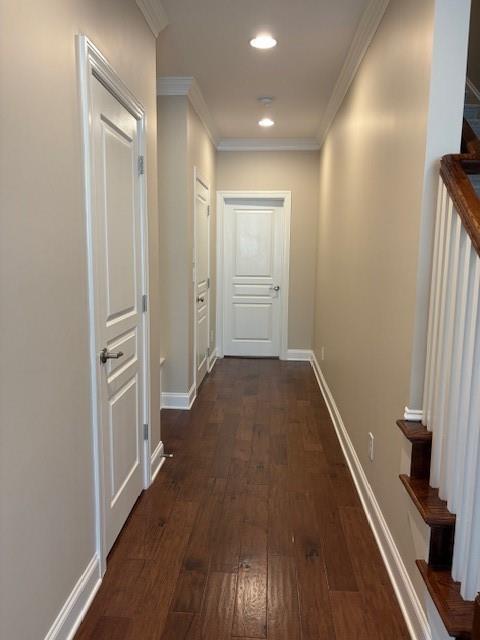430 La Perla Dr, Sugar Hill, GA 30518 - hallway with dark wood-style floors, crown molding, and recessed lighting