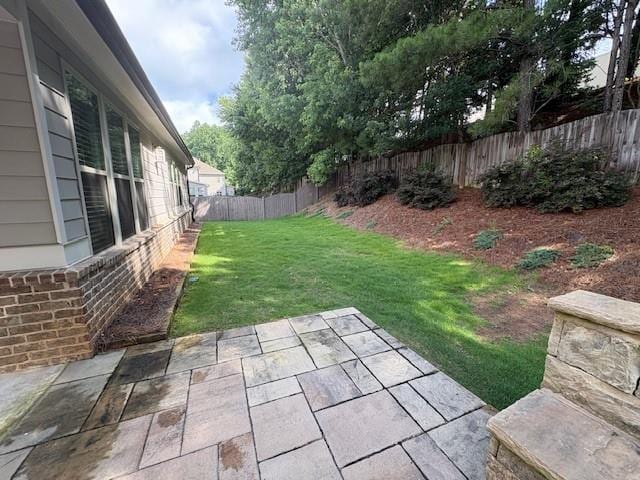 430 La Perla Dr, Sugar Hill, GA 30518 - fenced backyard featuring a patio