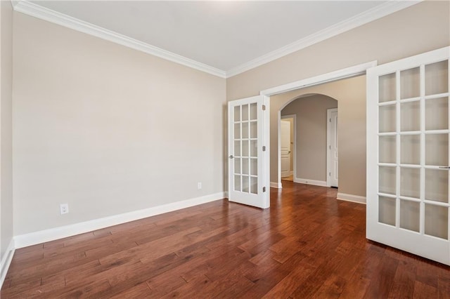 430 La Perla Dr, Sugar Hill, GA 30518 - unfurnished room featuring arched walkways, french doors, ornamental molding, and wood finished floors