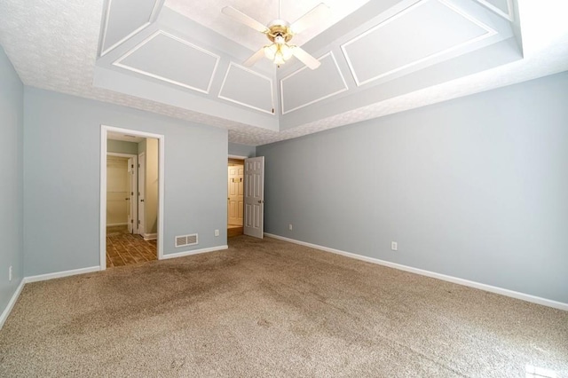 unfurnished bedroom featuring baseboards, visible vents, and carpet floors