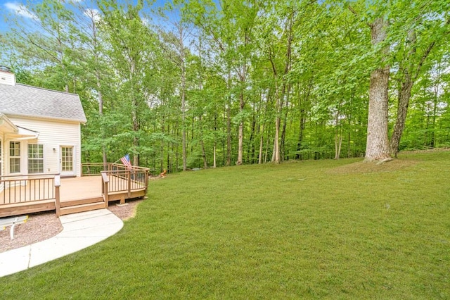 view of yard featuring a deck