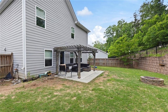 rear view of property featuring a pergola, a patio, a fenced backyard, an outdoor fire pit, and a yard