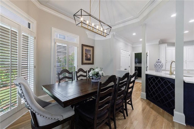 1021 Wetherby Way, Johns Creek, GA 30022 - dining area with ornamental molding, a chandelier, light wood finished floors, and recessed lighting