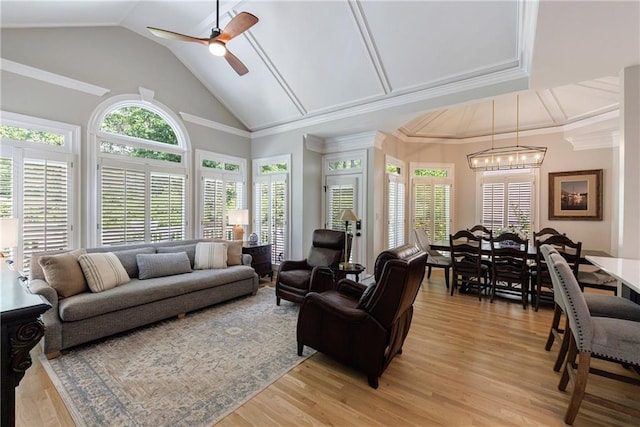 1021 Wetherby Way, Johns Creek, GA 30022 - living room featuring a chandelier, ceiling fan, light wood finished floors, and high vaulted ceiling