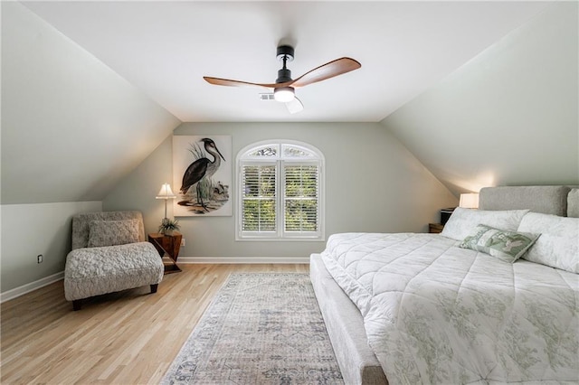 1021 Wetherby Way, Johns Creek, GA 30022 - bedroom with light wood finished floors, ceiling fan, baseboards, and lofted ceiling