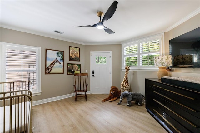 1021 Wetherby Way, Johns Creek, GA 30022 - foyer entrance featuring ceiling fan, light wood-style flooring, crown molding, and baseboards