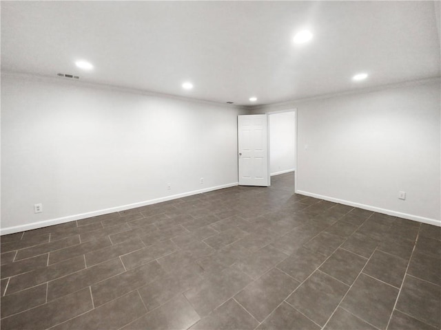 empty room featuring ornamental molding