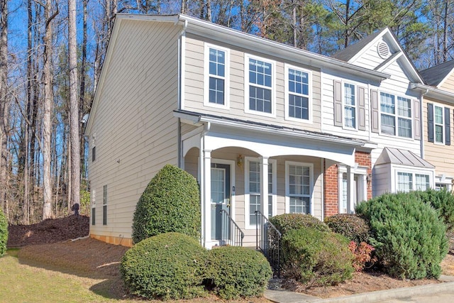 view of front of home with brick siding