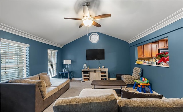 living room featuring ceiling fan, crown molding, light carpet, and vaulted ceiling