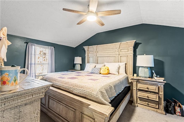 carpeted bedroom featuring ceiling fan and lofted ceiling