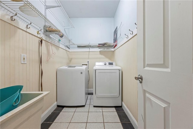 387 Lauren Marie Dr, Braselton, GA 30517 - washroom with washing machine and dryer, baseboards, and wooden walls