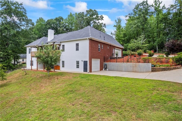 387 Lauren Marie Dr, Braselton, GA 30517 - view of side of property featuring a chimney, driveway, and a yard