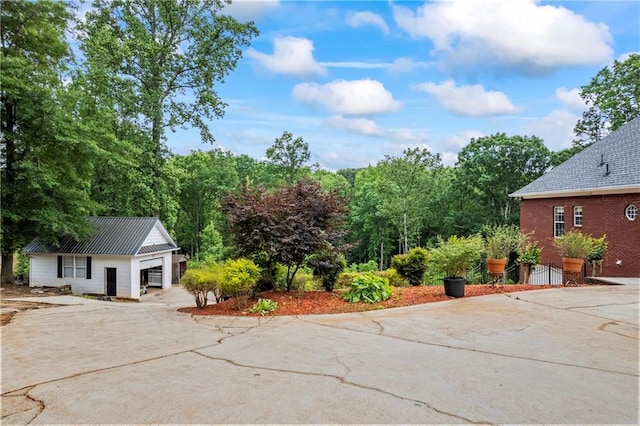 387 Lauren Marie Dr, Braselton, GA 30517 - view of patio / terrace with concrete driveway and an attached garage