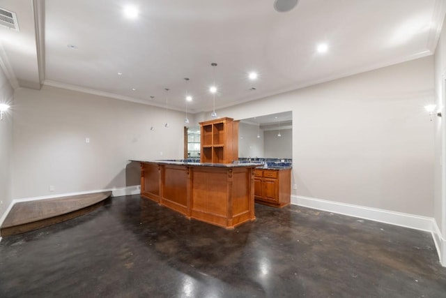 kitchen with a kitchen bar, baseboards, concrete floors, and brown cabinetry