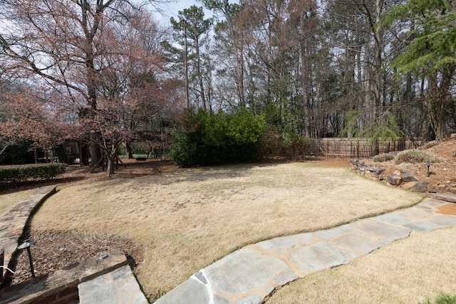 view of yard with fence