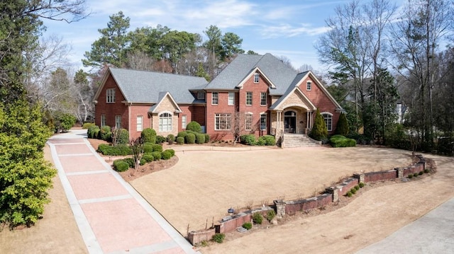 view of front of property featuring brick siding