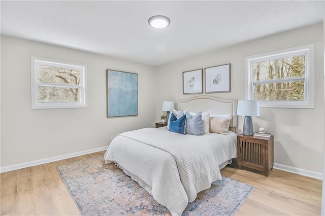 bedroom featuring light wood-type flooring