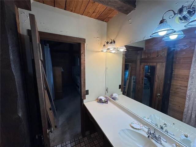 5834 Heardsville Rd, Cumming, GA 30028 - bathroom featuring wood ceiling, a sink, and tile patterned flooring