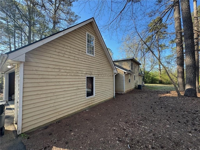 5834 Heardsville Rd, Cumming, GA 30028 - view of side of home featuring central air condition unit