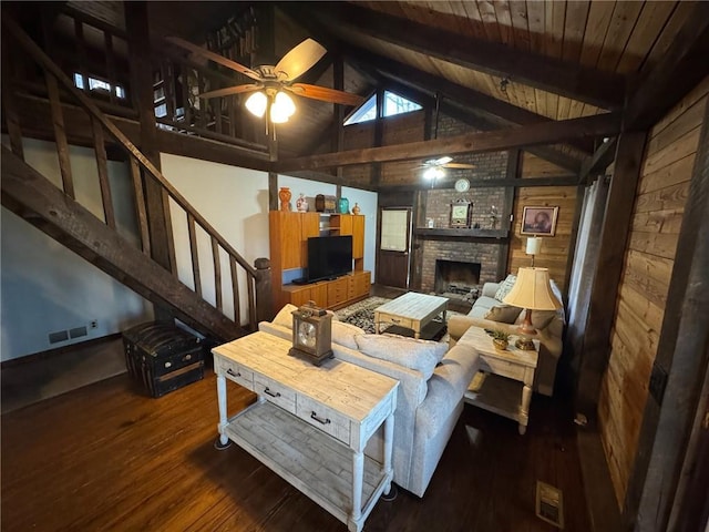 5834 Heardsville Rd, Cumming, GA 30028 - living area featuring visible vents, wooden walls, wood finished floors, and ceiling fan