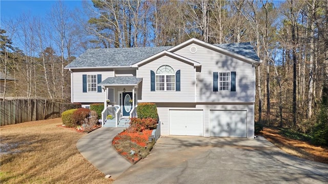 raised ranch featuring a garage