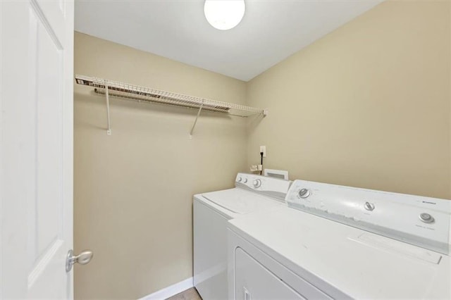 4701 Flat Shoals Rd Unit 37H, Union City, GA 30291 - washroom featuring separate washer and dryer and baseboards