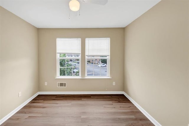 4701 Flat Shoals Rd Unit 37H, Union City, GA 30291 - unfurnished room with wood finished floors, ceiling fan, and baseboards