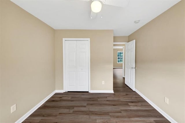4701 Flat Shoals Rd Unit 37H, Union City, GA 30291 - unfurnished bedroom featuring wood finished floors, baseboards, a closet, and ceiling fan
