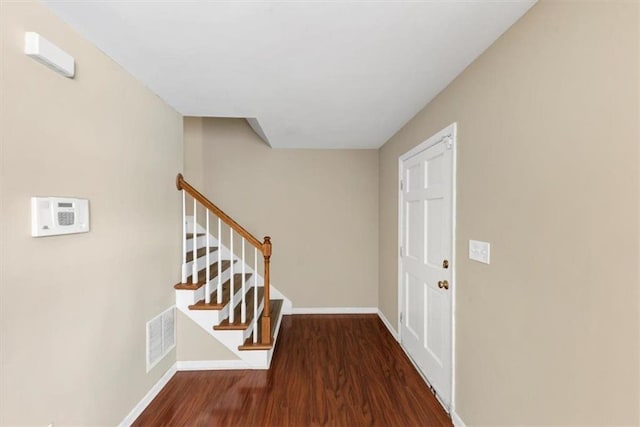 4701 Flat Shoals Rd Unit 37H, Union City, GA 30291 - foyer featuring wood finished floors, baseboards, and stairs
