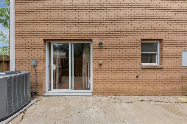 4701 Flat Shoals Rd Unit 37H, Union City, GA 30291 - entrance to property with central air condition unit, brick siding, and a patio area
